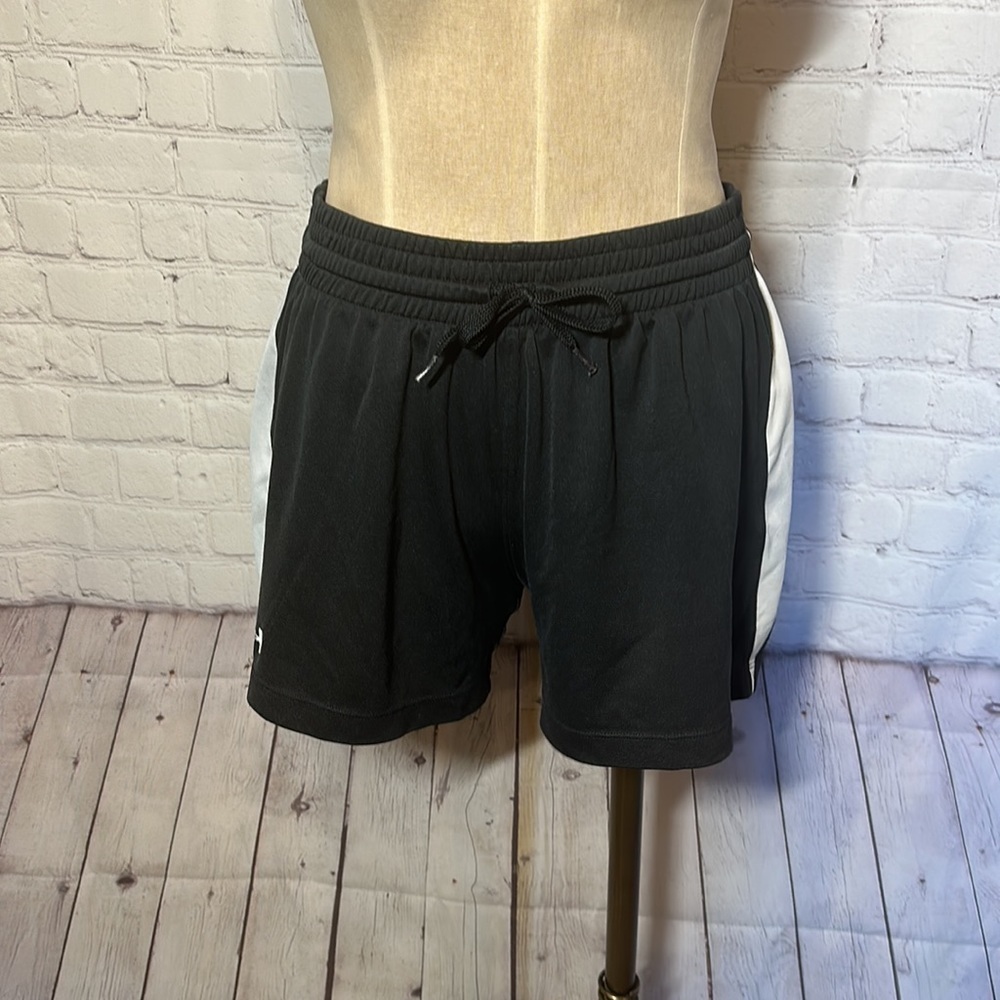 Under armour running shorts black and white medium